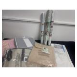 3 rolls of liner, storage bags, caddy and fabric