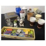 Group of mini jars and shakers and figurines