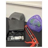 Fan with box and Wahl slippers and caulk gun
