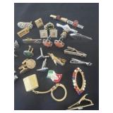 Group of cuff links and tie pins