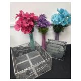 Metal crate and 3 floral arrangers and candle