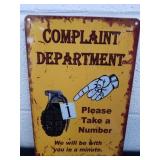 12x8 inch metal Complaint sign.