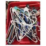 Large red tote full of hangers