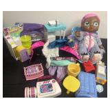Baby doll clothes and toys