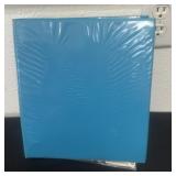 Binder of football cards