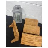 4 wood shelves and lantern