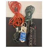 Group of surge protectors and extension cords