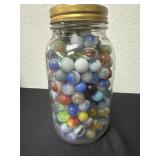 7ï¿½ jar full of vintage marbles One uranium one