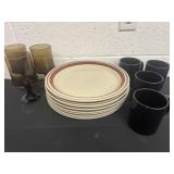 Plates glass cups and 4 black coffee cups