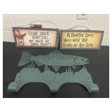 Metal fish hook with 2 wood hunter signs