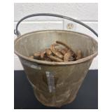 10ï¿½x11ï¿½ bucket of horse shoes