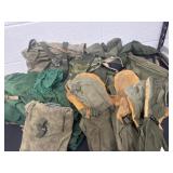 Box of military surplus cold weather gear gators