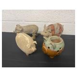 4 pig figurines