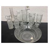 Boot mugs and vases and syrup bottle and glass