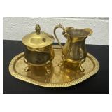 vintage brass sugar bowl and creamer set with a