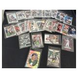 Group of NFL quarterback trading cards in