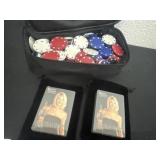 Bag of poker chips and 2 black velvet deck of
