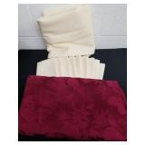 Two tablecloths and 9 napkins