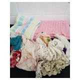 Vintage baby blankets and doilies
