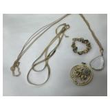 2 necklaces and pendants with abalone baby