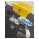 Yellow tote with saftey glasses sunglasses and