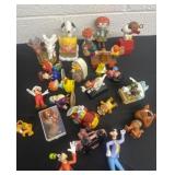 Group of kids toys: goofy, Rugrats, Dora, snoopy