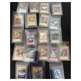 20 Konami Yu-Gi-Oh cards in protective sleeves