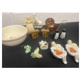 Group of salt and pepper shakers with bowl and