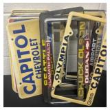 Group of licenses plate covers and plates