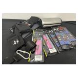 Group of Wrist Braces, Fight Gloves, And More