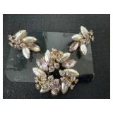 Purple floral broach with matching clip earrings