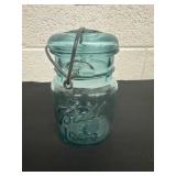 5.5ï¿½ glass blue mason jar.