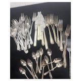 Box of assorted flatware.