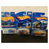 Three Hot Wheels cars