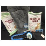 Pet mat and training pads 22x22 and. leash