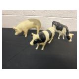 3 plastic farm animals cows and pig