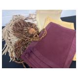 Group of placemats and curtain ties.
