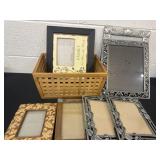 Group of picture frames and basket