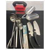 Group of kitchen knifeï¿½s scoops and ladles