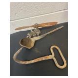 Ladle, hay hook and propeller.