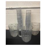 3 plastic pitchers and Coca Cola plastic glasses