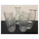 Group of glass and plastic pitchers
