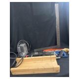 Group of saws and square.