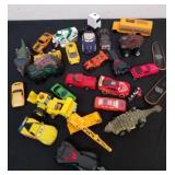 Toy cars, dinosaur cars and skateboards