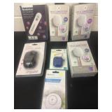 Group of sanitizer and AirPod case and mouse and