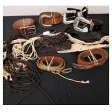 Large group of leather belts with beautiful