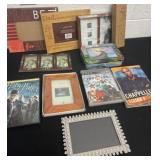 Group of picture frames DVDs
