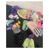 Group of Barbie clothes