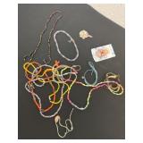 Group of necklaces and brackets