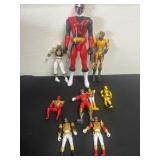 Group of power ranger action figures